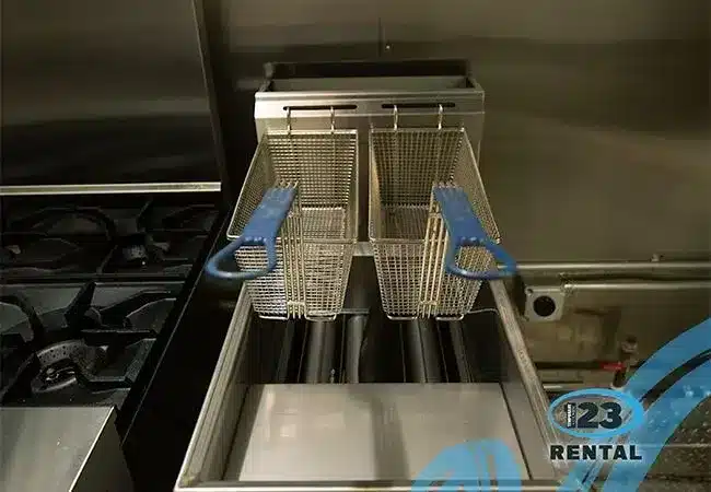 Commercial stainless steel equipment inside a target-owned mobile kitchen