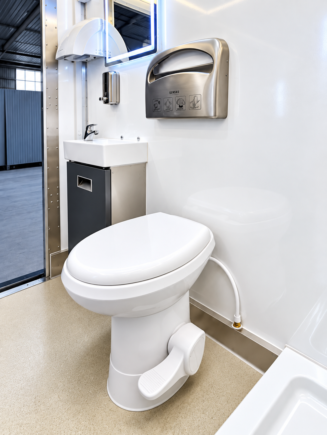 Interior fixtures inside a portable commercial restroom trailer rental