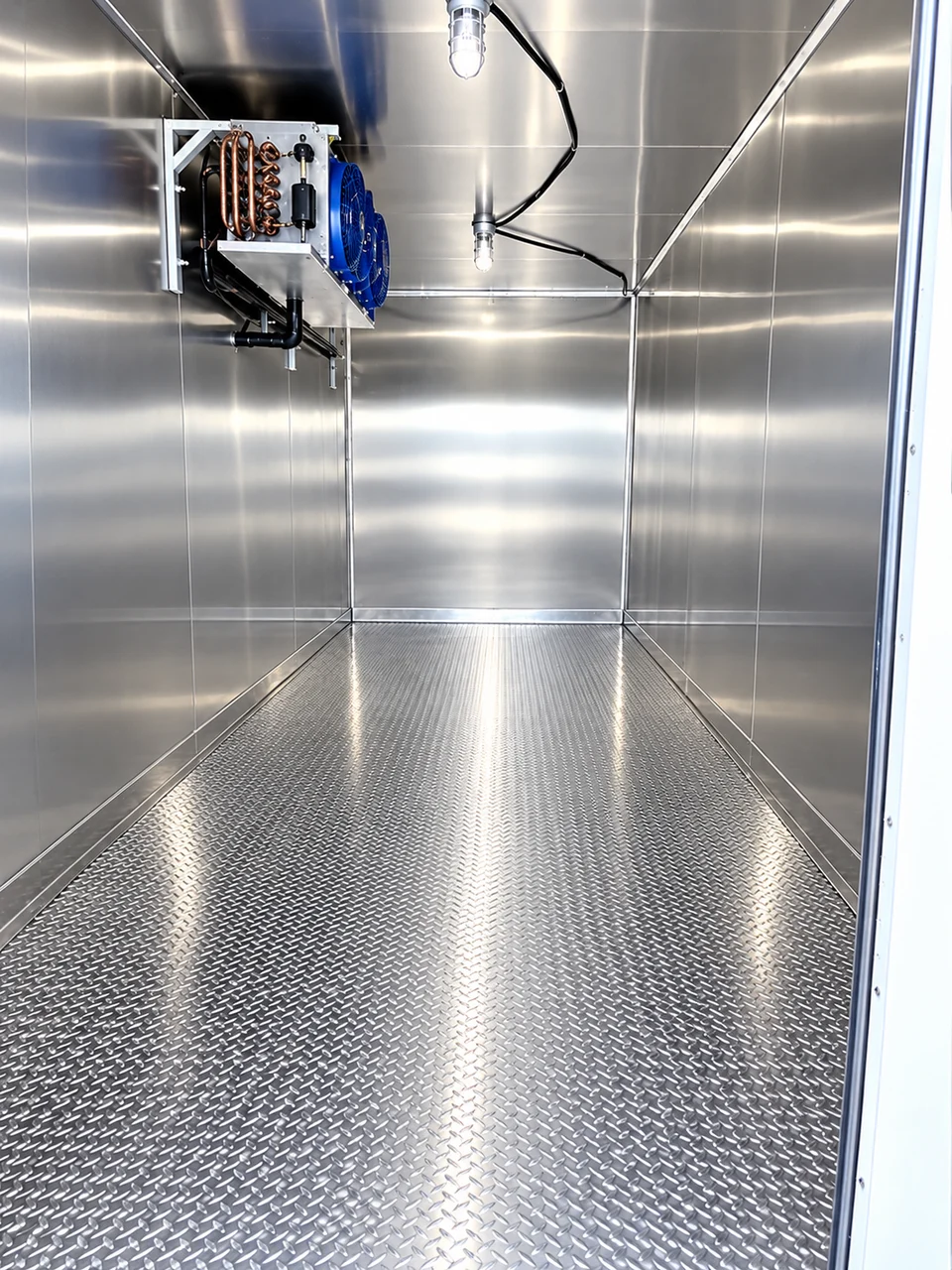 Insulated interior and cooling unit in a portable refrigerated trailer rental